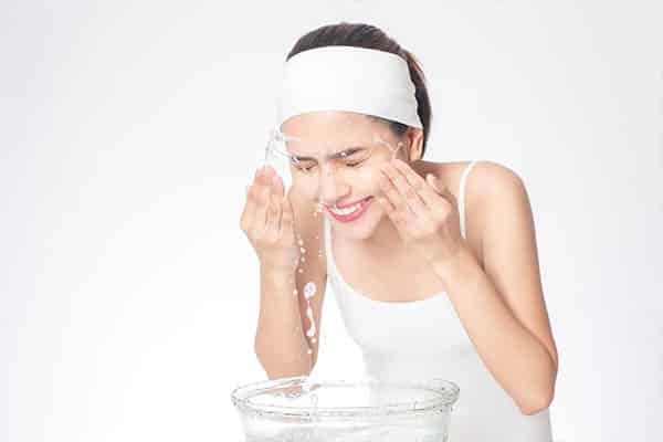 You should wash your face more often if you have to