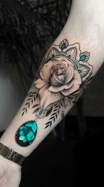 Emerald Tattoo Design With a Rose
